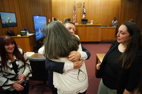 Michael Buehner hugs his aunt Lisa Cengia after a jury in Cuyahoga County found him not guilty of murder on Wednesday, July 19, 2023, two years after his two-decade-old conviction was overturned by an Ohio appeals court.