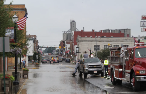  Water begins to spill over East Main Street in downtown Shelby during a flood in July, 2013.