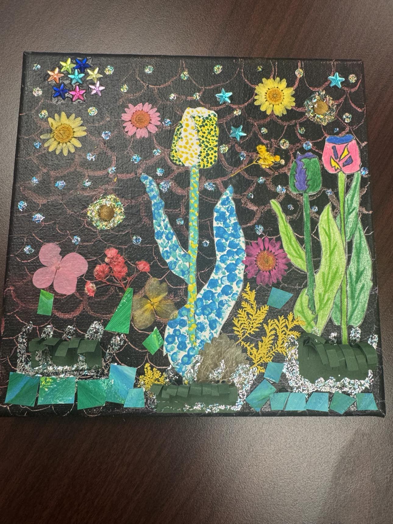 A piece of art showcasing colorful flowers and greenery done by Sarah from Zeph