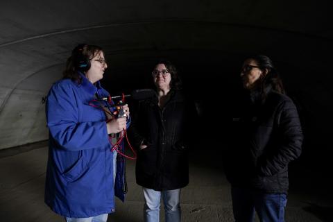 Ella Rowen, Becca Costello and the Metropolitan Sewer District's Deb Leonard in the Lick Run stormwater drain in Cincinnati in March 2024.