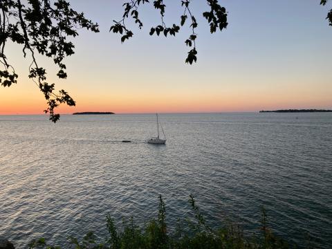 The sun sets over Lake Erie, which has long been embroiled in legal debate over the best way to protect the waterway's water quality. 