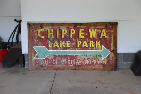  A road sign directing visitors on how to get to Chippewa Lake Park in Medina County. The park was a summer destination for Ohioans for almost 100 years until its closure in 1978. 