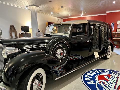 A 1938 Packard is just one of the many funerary artifacts that Bill Peoples collects at Peoples Mortuary Museum in Marietta.